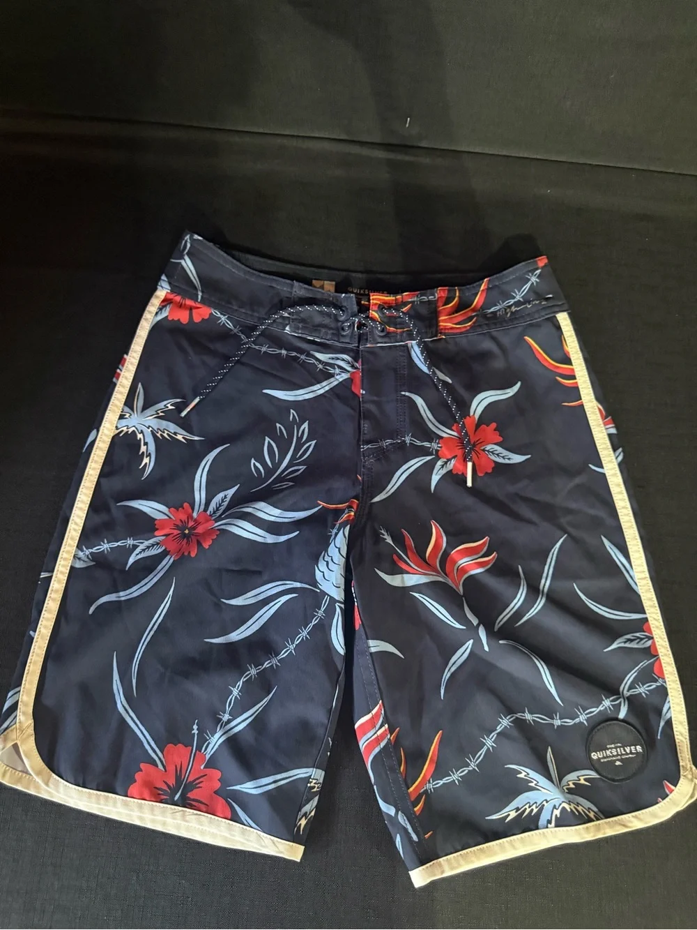 Quiksilver Navy Floral Swim Trunks with Red and Light Blue Accents